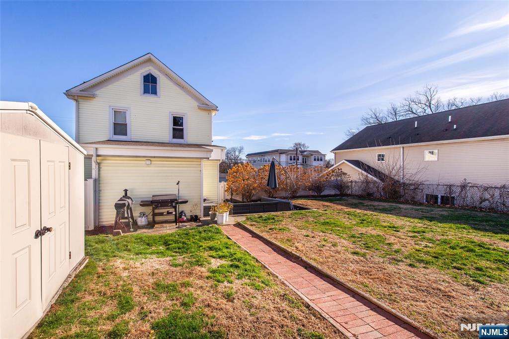 405 Washington Street Boonton, NJ 07005 - Photo 6 of 26 a view of a backyard with sitting area