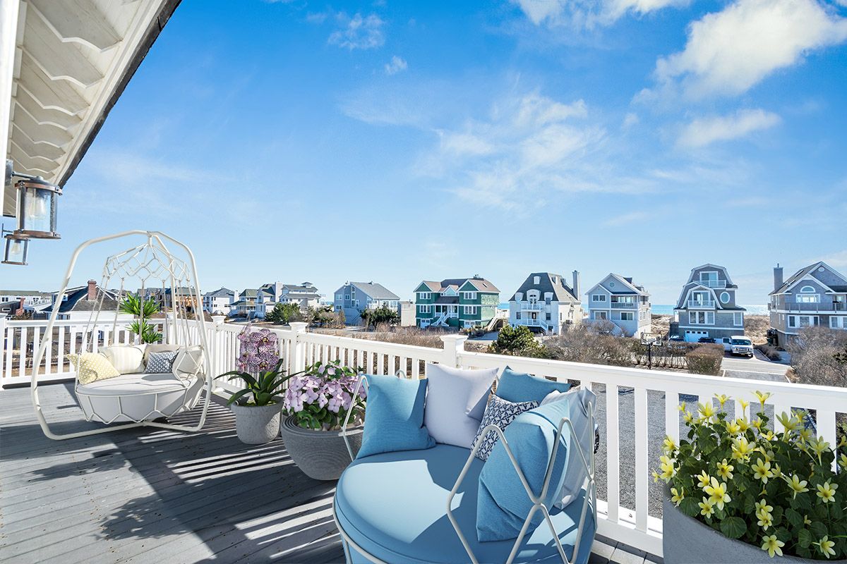 798 Dune Road Westhampton Beach, NY 11978 - Photo 17 of 22 a view of a chairs and tables in the balcony