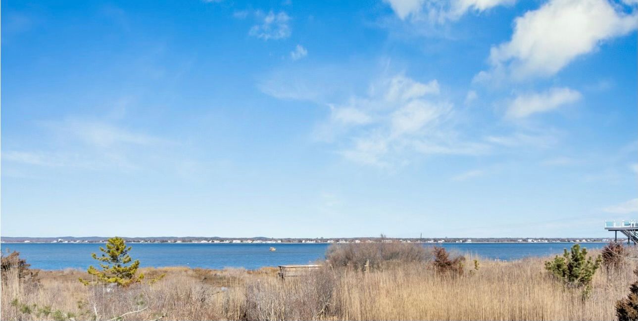 798 Dune Road Westhampton Beach, NY 11978 - Photo 3 of 22 a view of lake and mountain