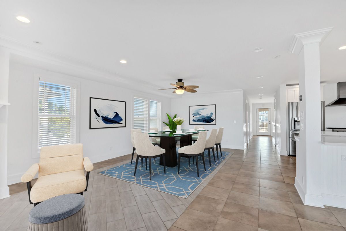 798 Dune Road Westhampton Beach, NY 11978 - Photo 8 of 22 a living room with furniture a dining table and a potted plant