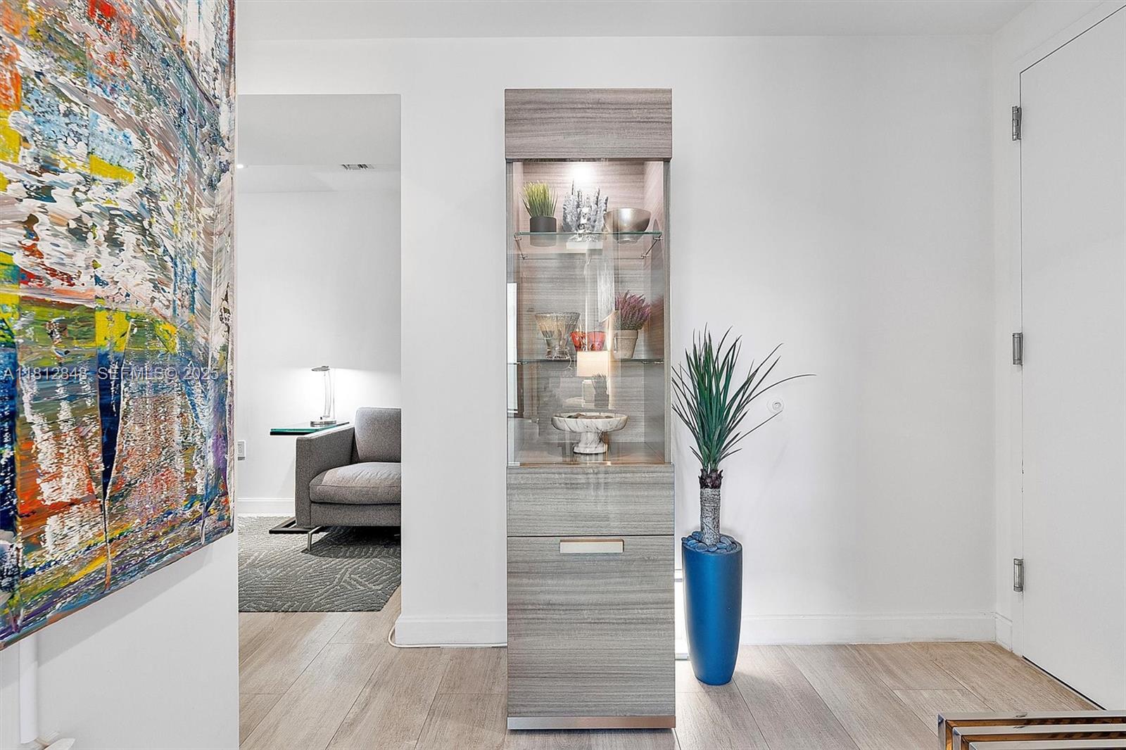 55 Southwest 9th Street, Unit 1510 Miami, FL 33130 - Photo 22 of 46 a view of living room filled with furniture and a potted plant