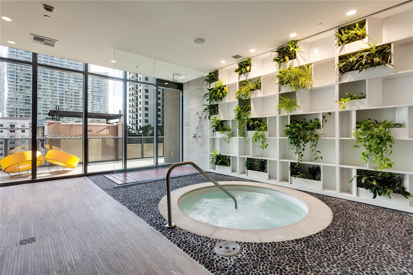 55 Southwest 9th Street, Unit 1510 Miami, FL 33130 - Photo 32 of 46 a indoor swimming pool and mountain view