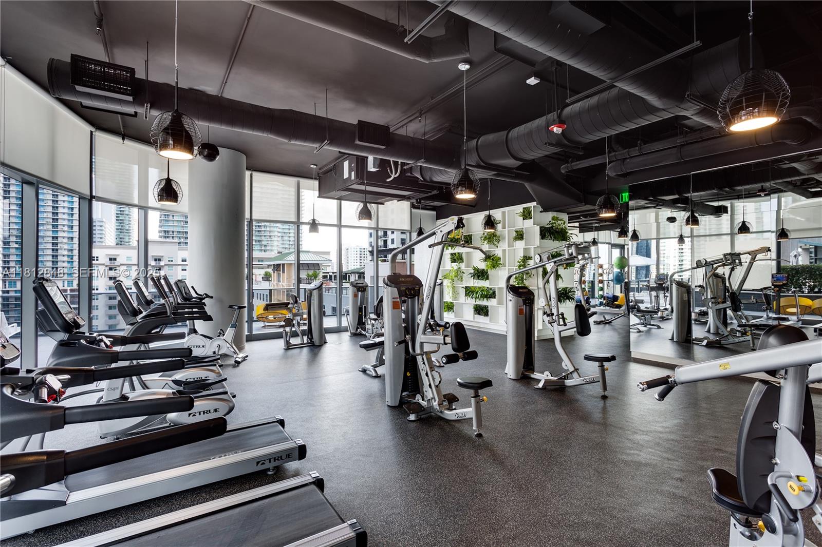 55 Southwest 9th Street, Unit 1510 Miami, FL 33130 - Photo 33 of 46 a view of a room with gym equipment