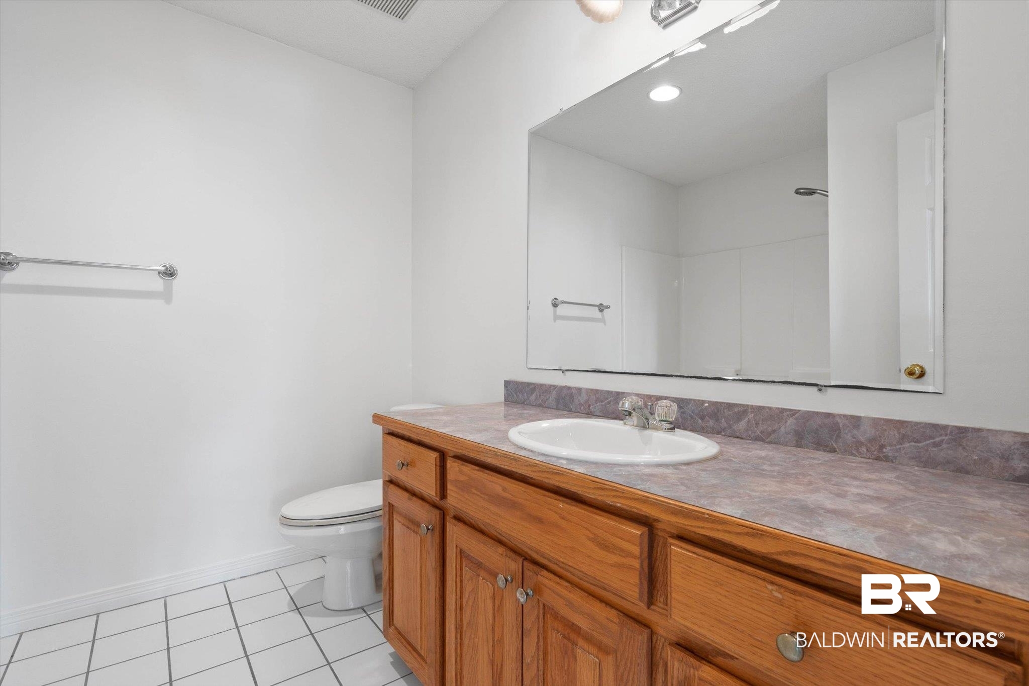 3847 Riviere Du Chien Road Mobile, AL 36693 - Photo 23 of 51 Full bathroom featuring vanity and light tile patterned flooring