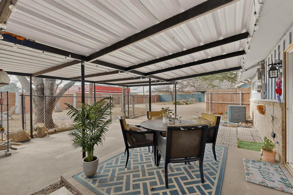 153 Sheri Lane Hurst, TX 76053 - Photo 7 of 16 157 Side - Patio