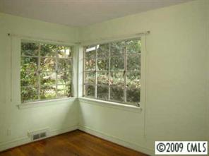 111 McAlway Road Charlotte, NC 28211 - Photo 6 of 8 a view of an empty room with a window