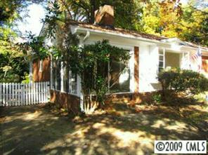111 McAlway Road Charlotte, NC 28211 - Photo 7 of 8 a view of a house with a yard