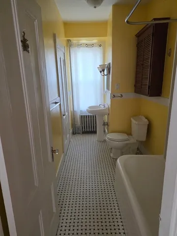 a bathroom with a sink and a shower