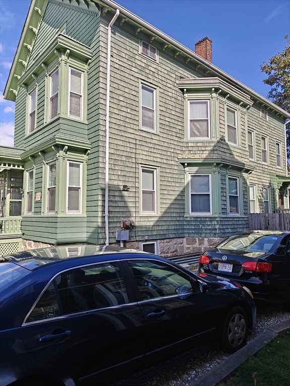 177 Highland Avenue, Unit 1 Fall River, MA 02720 - Photo 36 of 36 a couple of cars parked in front of a house
