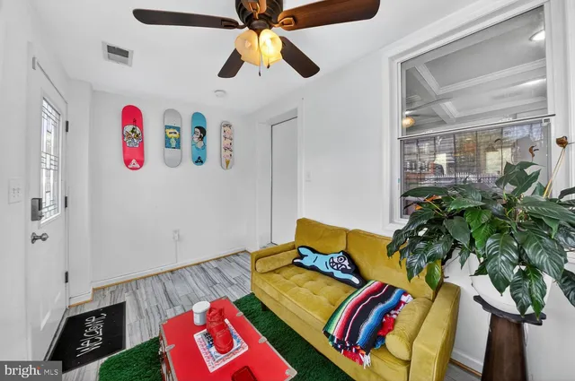 a bed room with a bed and a book shelf