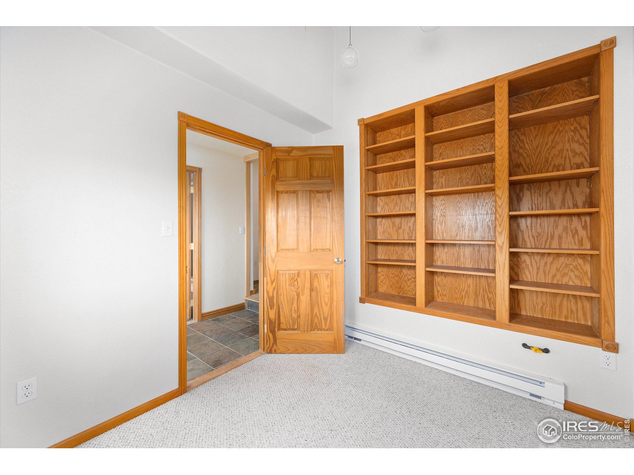 3805 Davis Ranch Road Bellvue, CO 80512 - Photo 31 of 39 Office space with bookshelves