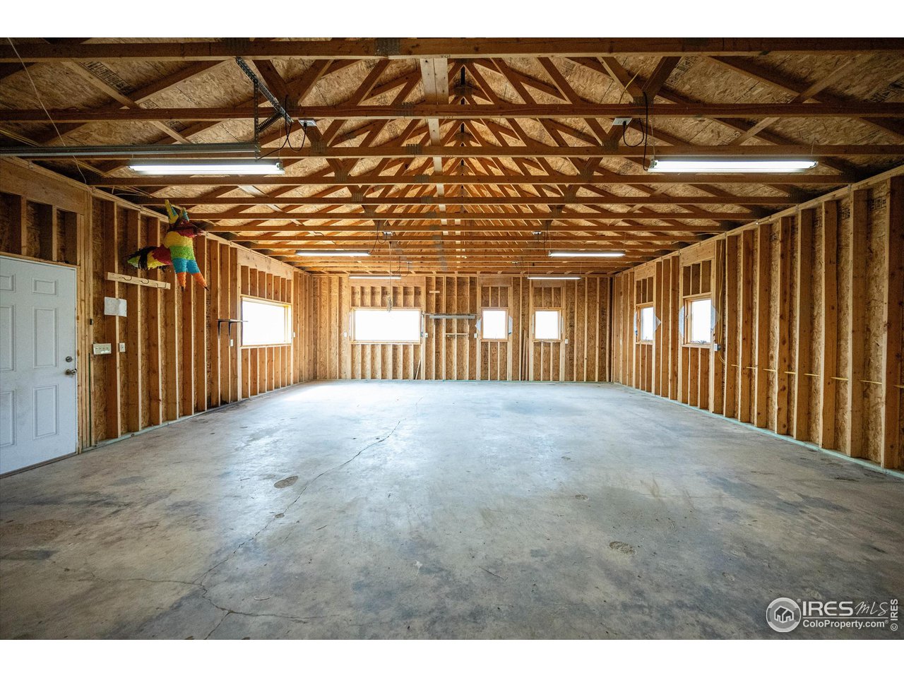 3805 Davis Ranch Road Bellvue, CO 80512 - Photo 35 of 39 Large shop, or space for toys