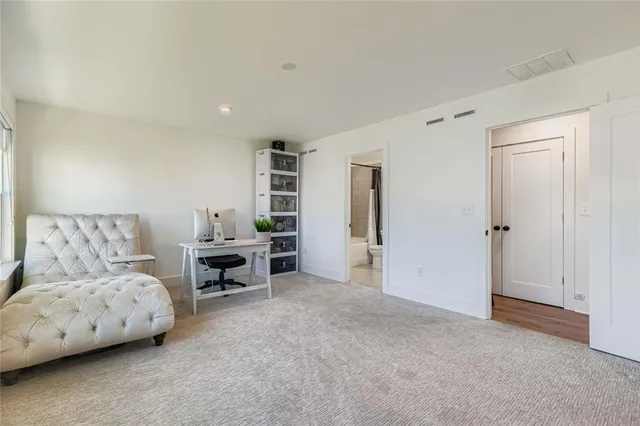 a living room with furniture and furniture