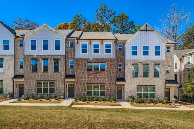 a front view of a building with street view