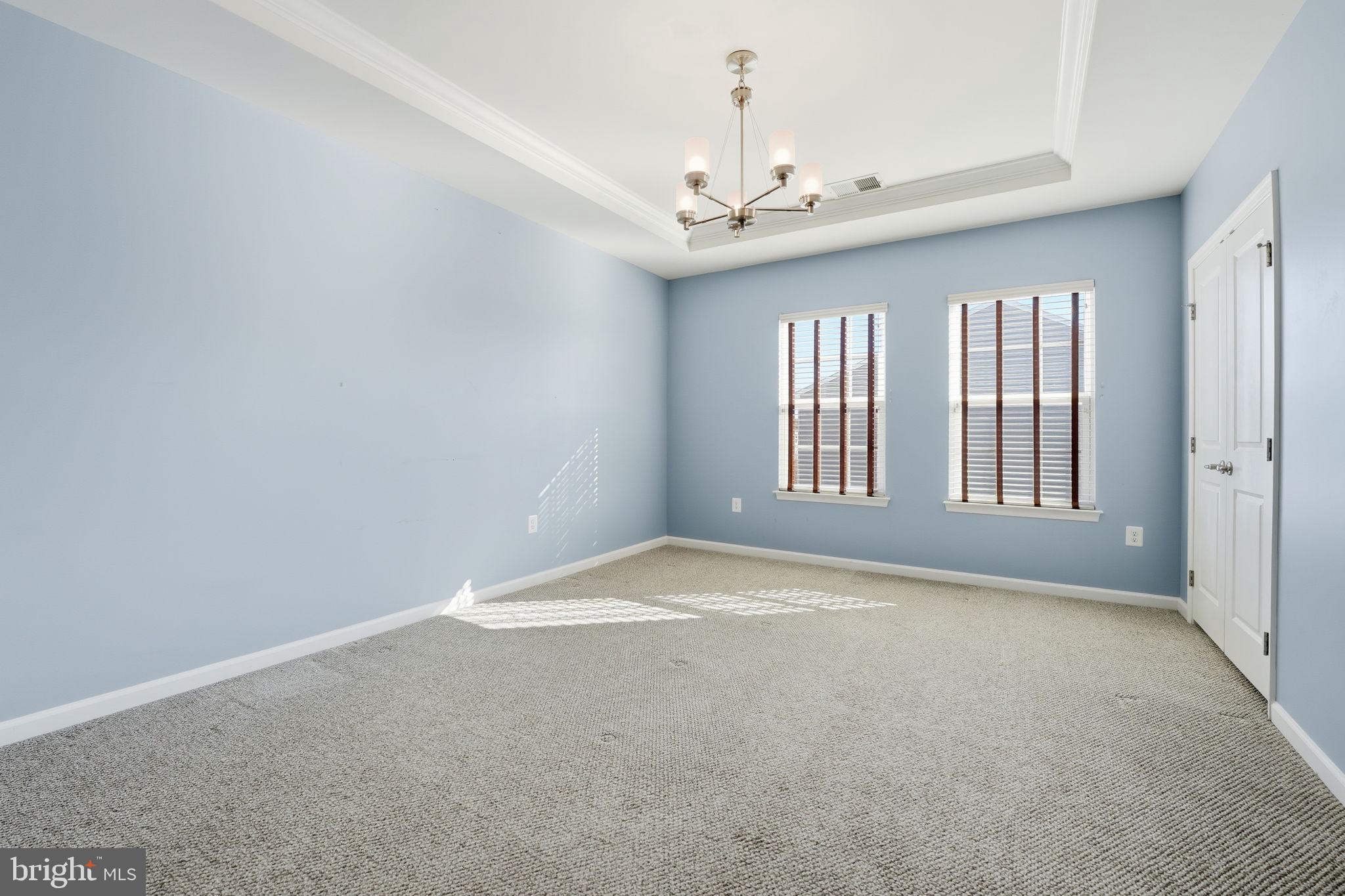 14619 Featherstone Gate Drive Woodbridge, VA 22191 - Photo 13 of 20 a view of an empty room with windows