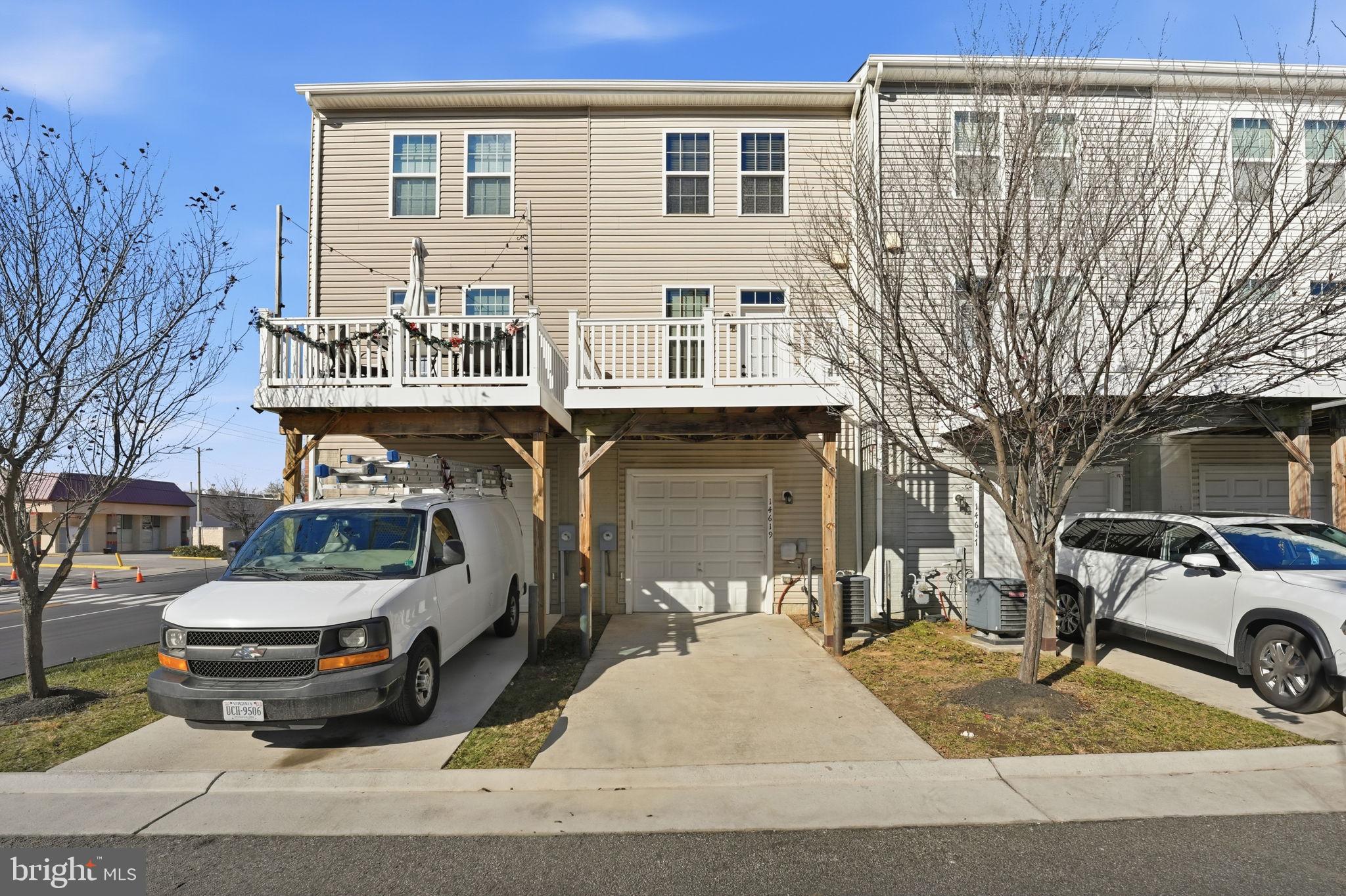 14619 Featherstone Gate Drive Woodbridge, VA 22191 - Photo 20 of 20 a view of a car park in front of house