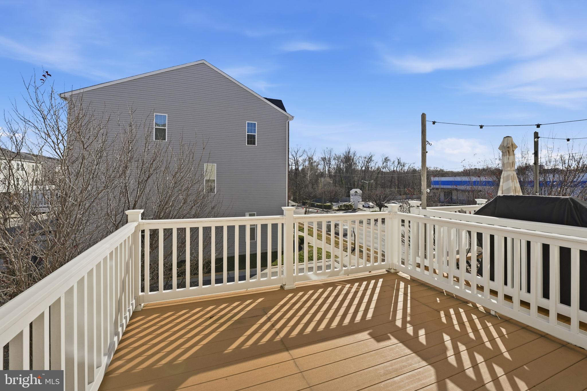 14619 Featherstone Gate Drive Woodbridge, VA 22191 - Photo 9 of 20 a view of a wooden roof deck