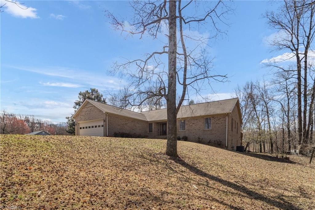 7721 Alcorn Road Greensboro, NC 27409 - Photo 3 of 49