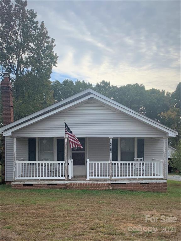 4215 Poplar Tent Road Concord, NC 28027 - Photo 1 of 22 a view of a house with a window