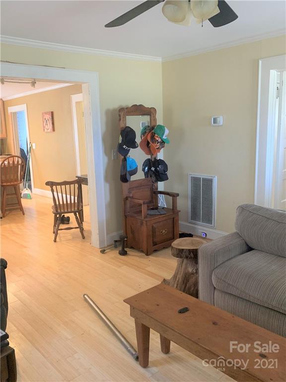 4215 Poplar Tent Road Concord, NC 28027 - Photo 11 of 22 a living room with furniture