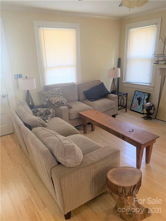 4215 Poplar Tent Road Concord, NC 28027 - Photo 12 of 22 a living room with furniture and a window