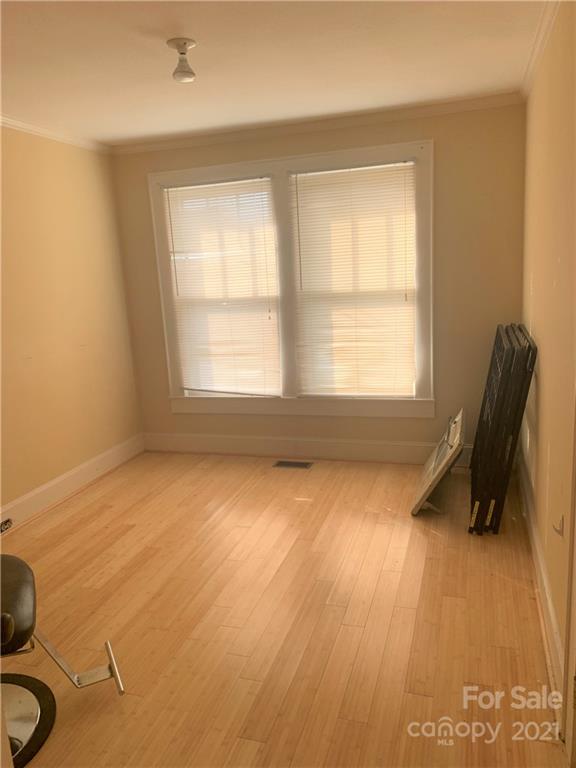 4215 Poplar Tent Road Concord, NC 28027 - Photo 17 of 22 a view of an empty room and window