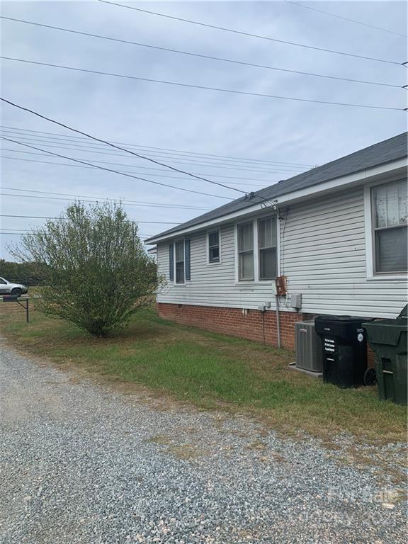 4215 Poplar Tent Road Concord, NC 28027 - Photo 22 of 22 a backyard of a house