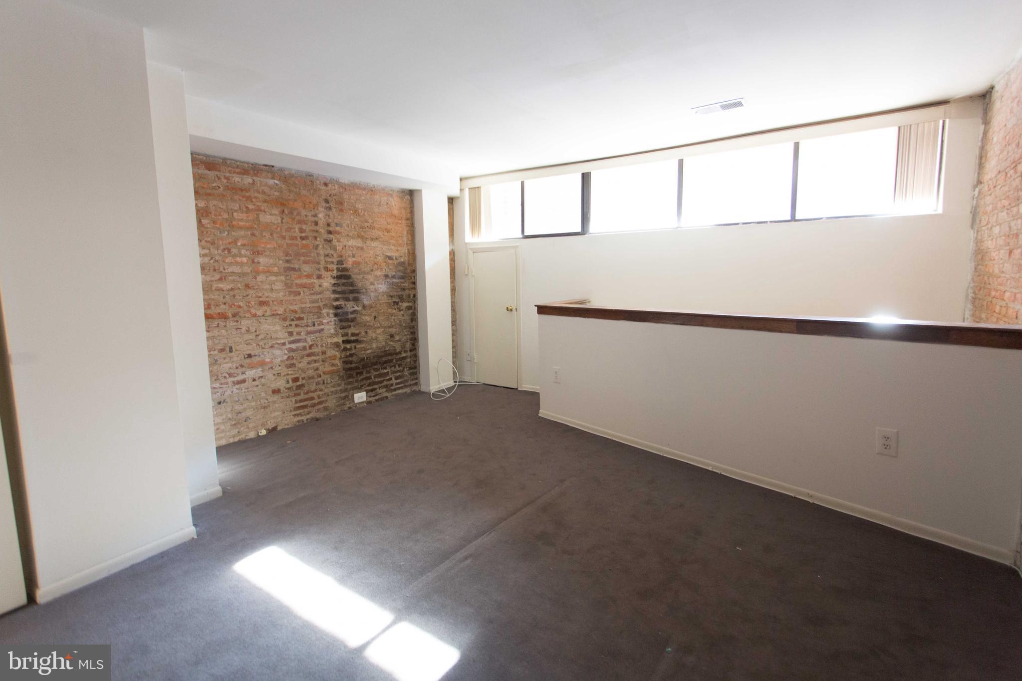 2031-8 South Street, Unit 123 Philadelphia, PA 19146 - Photo 23 of 31 a view of an empty room with closet area