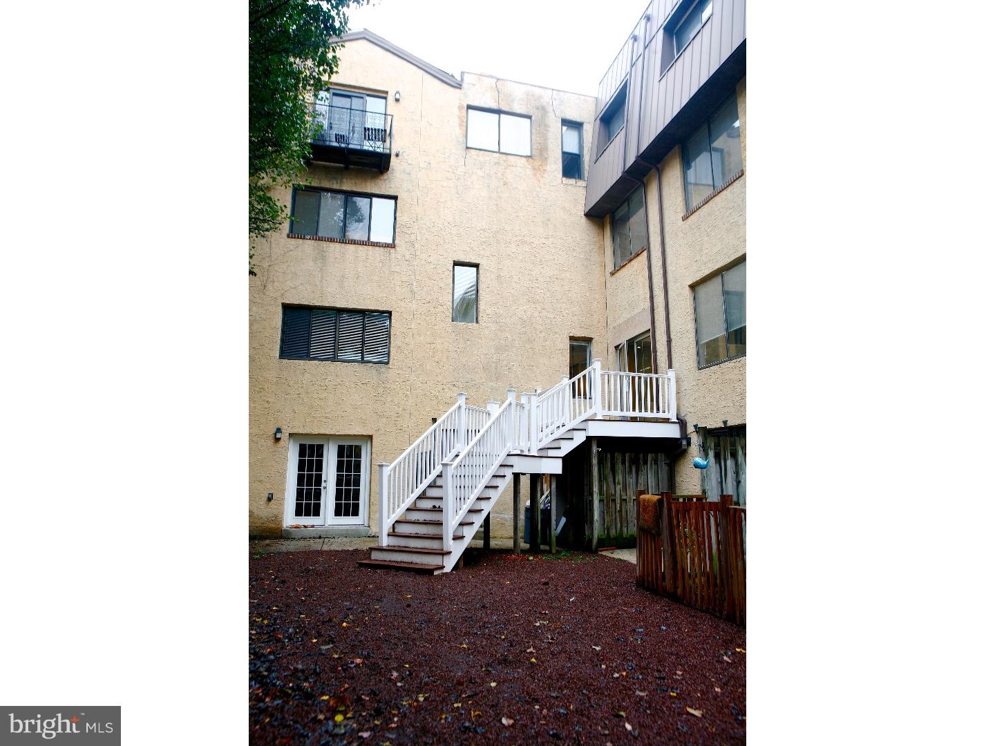 2031-8 South Street, Unit 123 Philadelphia, PA 19146 - Photo 5 of 31 a view of a house with a balcony