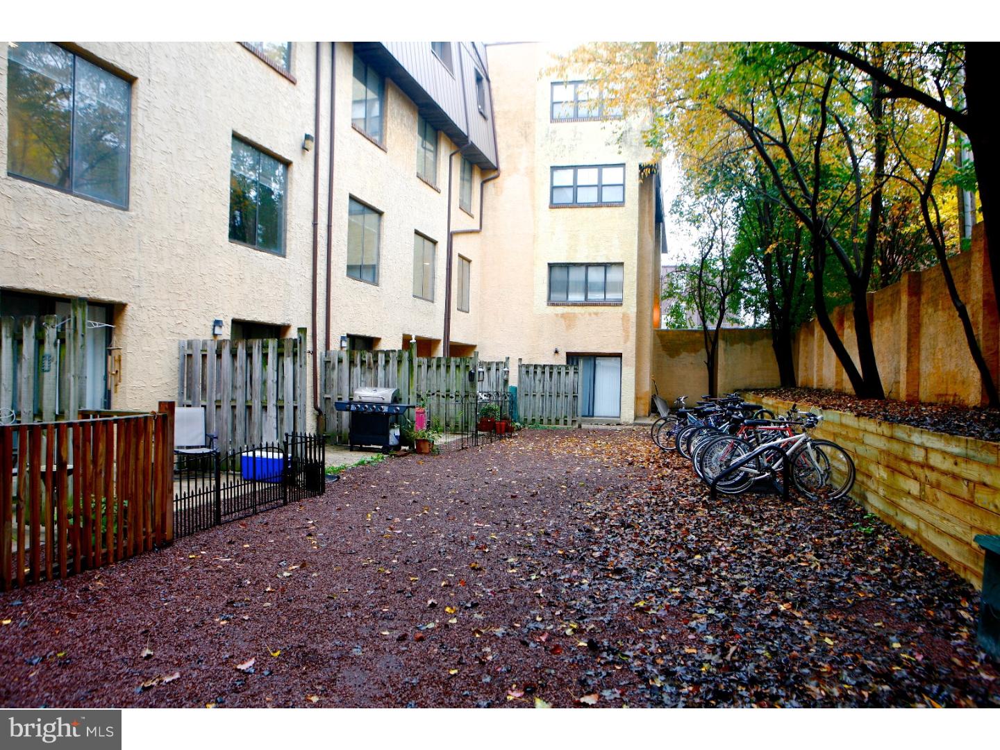 2031-8 South Street, Unit 123 Philadelphia, PA 19146 - Photo 6 of 31 a view of street with tall buildings