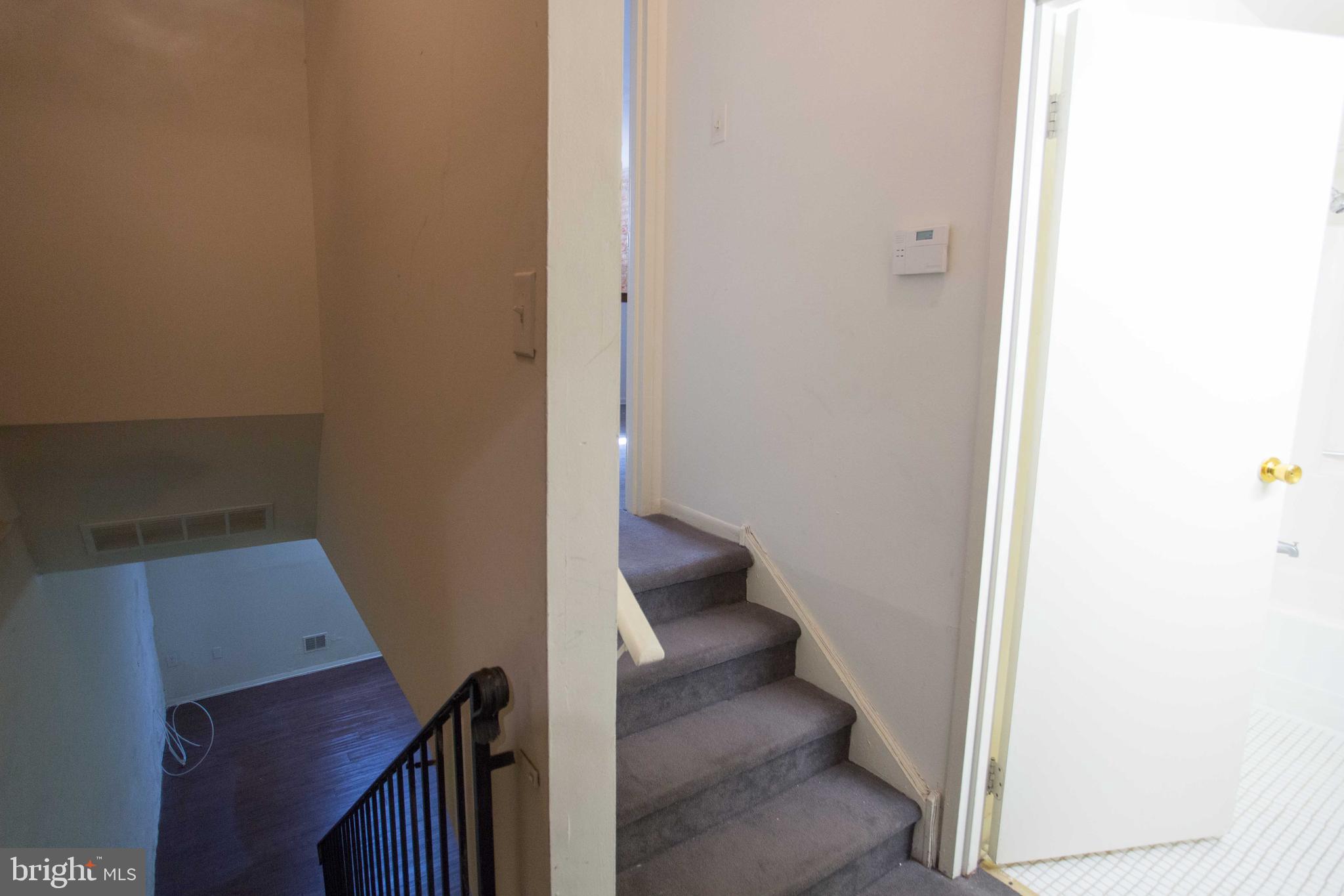 2031-8 South Street, Unit 123 Philadelphia, PA 19146 - Photo 10 of 31 a view of a room with wooden floor