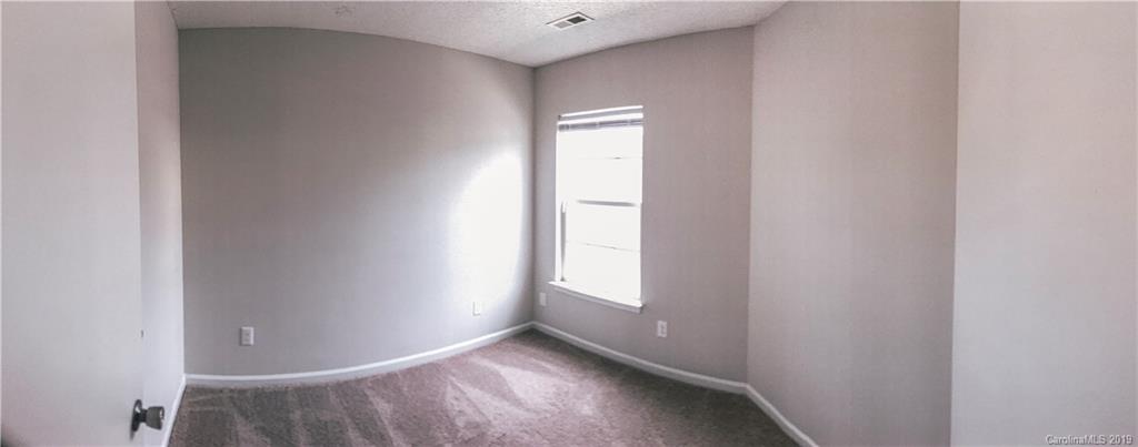 2039 Pimpernel Road Charlotte, NC 28213 - Photo 23 of 44 a view of an empty room and window