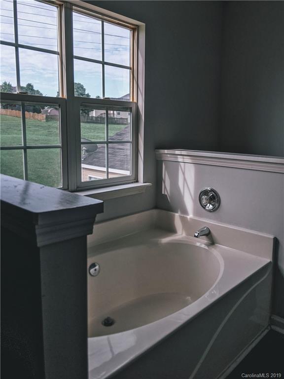 2039 Pimpernel Road Charlotte, NC 28213 - Photo 24 of 44 a bathroom with a sink and a window