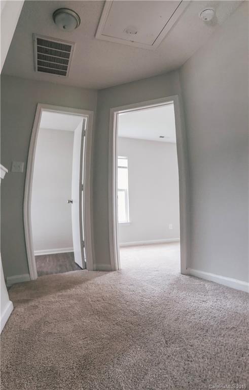 2039 Pimpernel Road Charlotte, NC 28213 - Photo 44 of 44 an empty room with windows