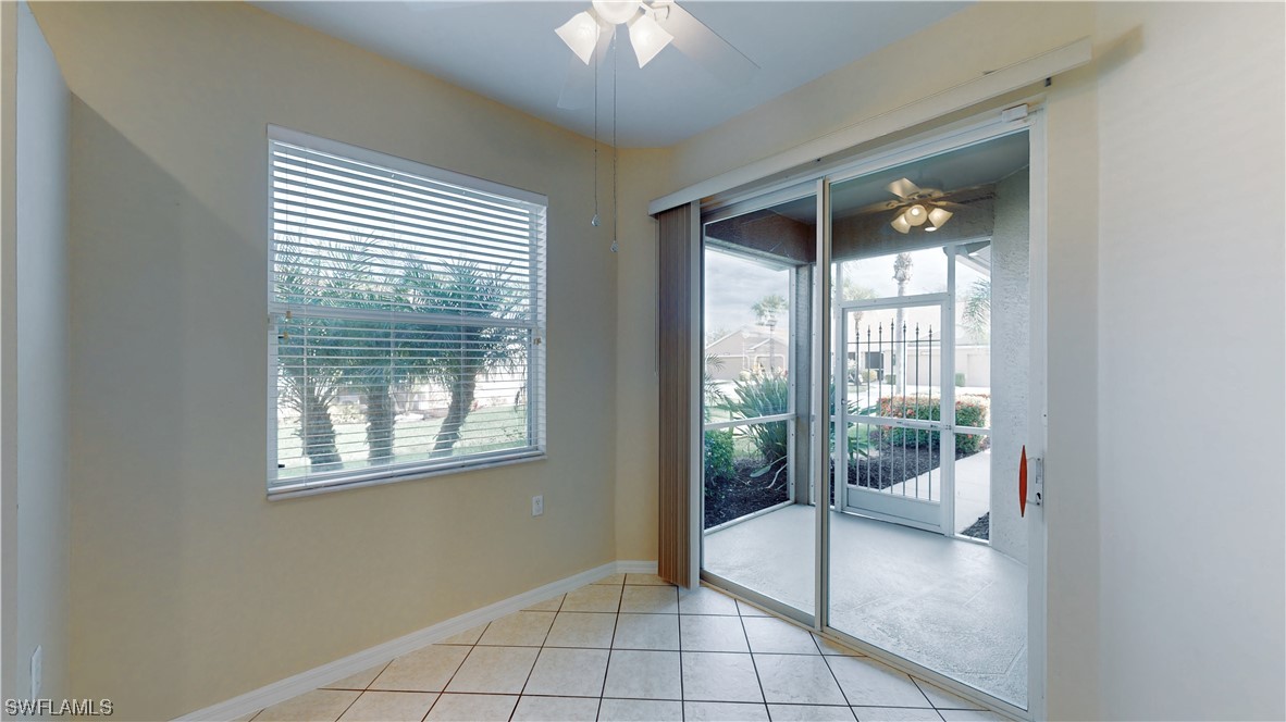 21540 Portrush Run Estero, FL 33928 - Photo 12 of 32 a view of an empty room with a balcony