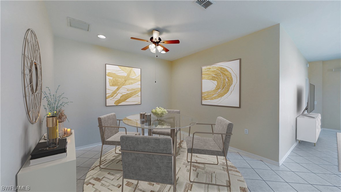21540 Portrush Run Estero, FL 33928 - Photo 13 of 32 a dining room with furniture and window