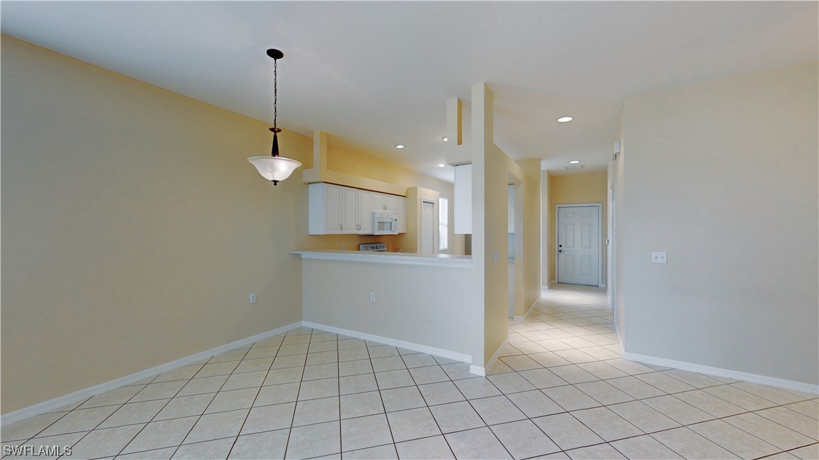 21540 Portrush Run Estero, FL 33928 - Photo 15 of 32 a view of an empty room and window