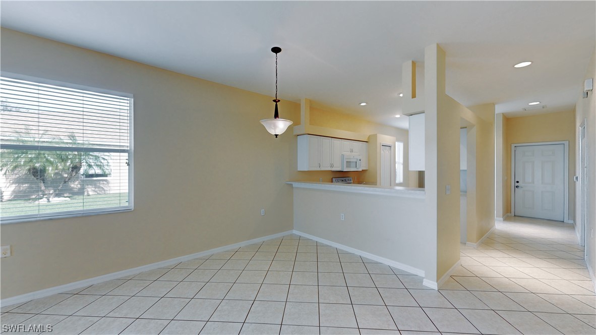 21540 Portrush Run Estero, FL 33928 - Photo 16 of 32 a view of an empty room and window