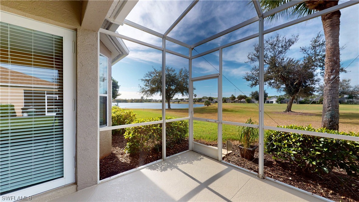 21540 Portrush Run Estero, FL 33928 - Photo 25 of 32 a view of a swimming pool with a patio