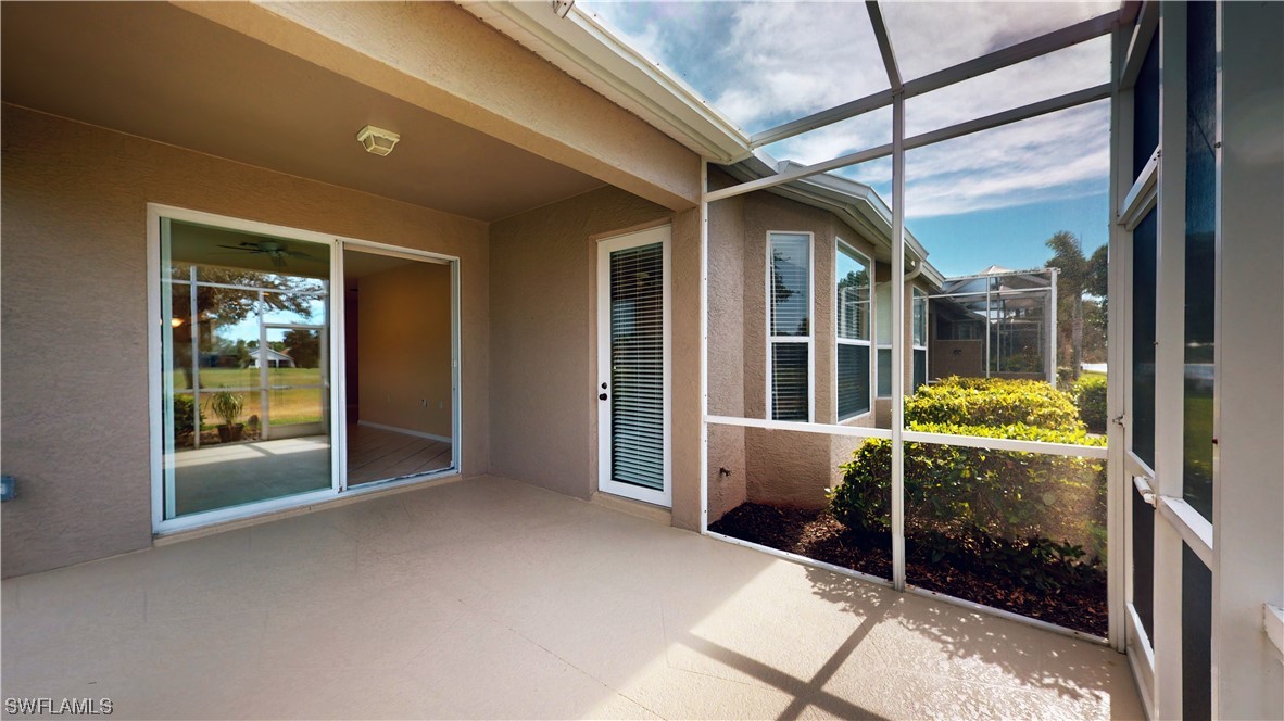 21540 Portrush Run Estero, FL 33928 - Photo 26 of 32 a view of an entryway with sitting area