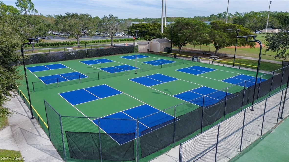 21540 Portrush Run Estero, FL 33928 - Photo 30 of 32 a aerial view of a yard tables and chairs
