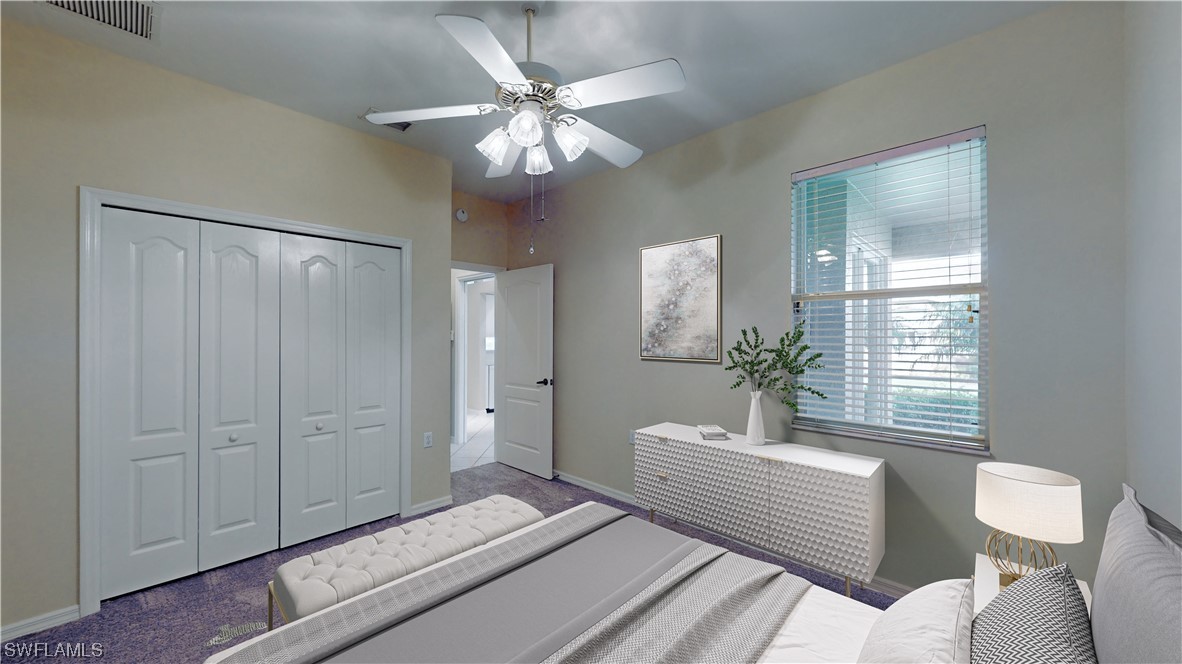 21540 Portrush Run Estero, FL 33928 - Photo 9 of 32 a living room with furniture and a large mirror