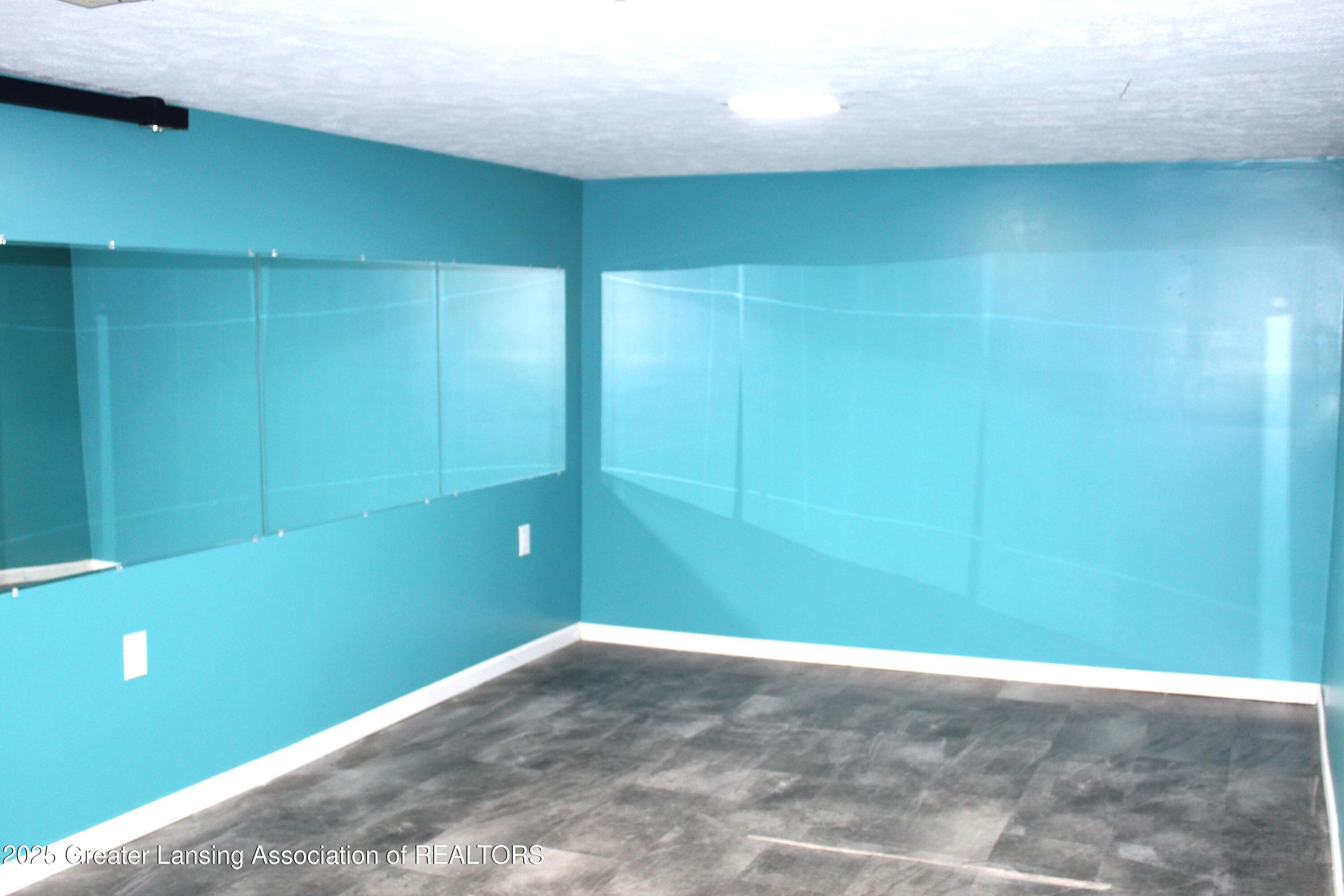 3922 Hunters Ridge Drive, Unit 3 Lansing, MI 48911 - Photo 29 of 44 family/rec room