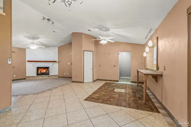 a view of a hallway with front door