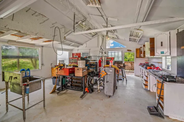 a view of a small pool with an outdoor space
