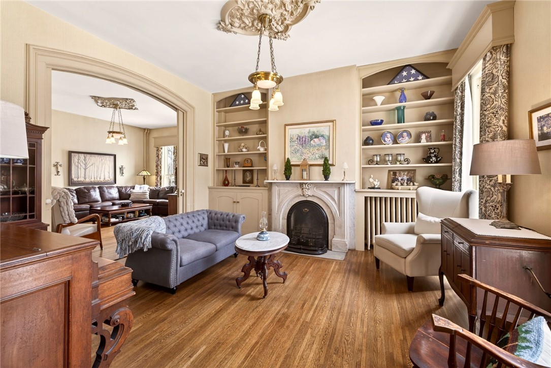 127 Maple Avenue Victor, NY 14564 - Photo 12 of 47 Formal living room with woodburning fireplace!