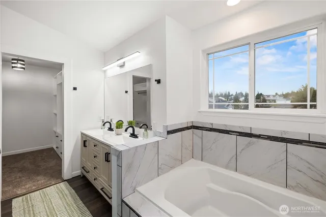 a bathroom with a sink and a bathtub