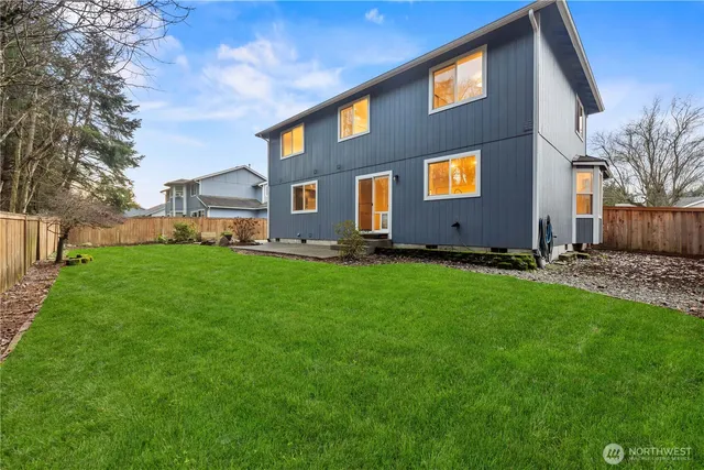 a front view of house with yard