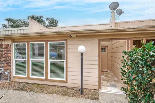 a front view of a house with a window