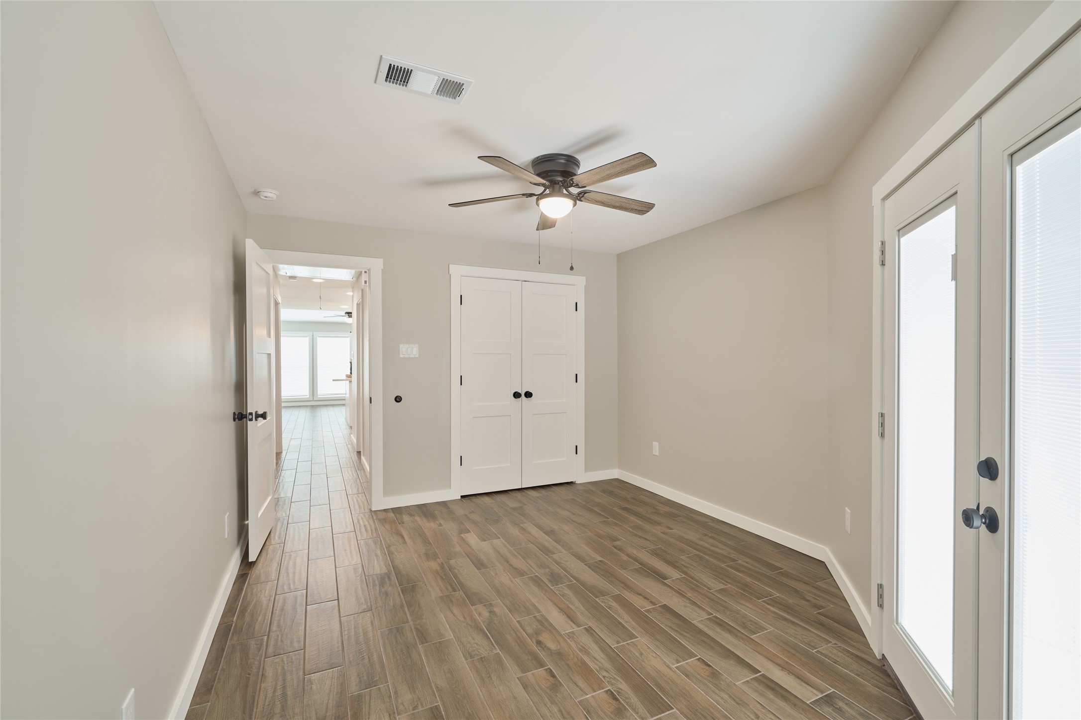 1014 Graham Drive, Unit L2 Tomball, TX 77375 - Photo 23 of 30 Secondary room with access to courtyard
